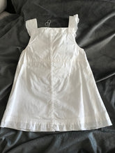 Load image into Gallery viewer, White embroidered baby dress - back view.